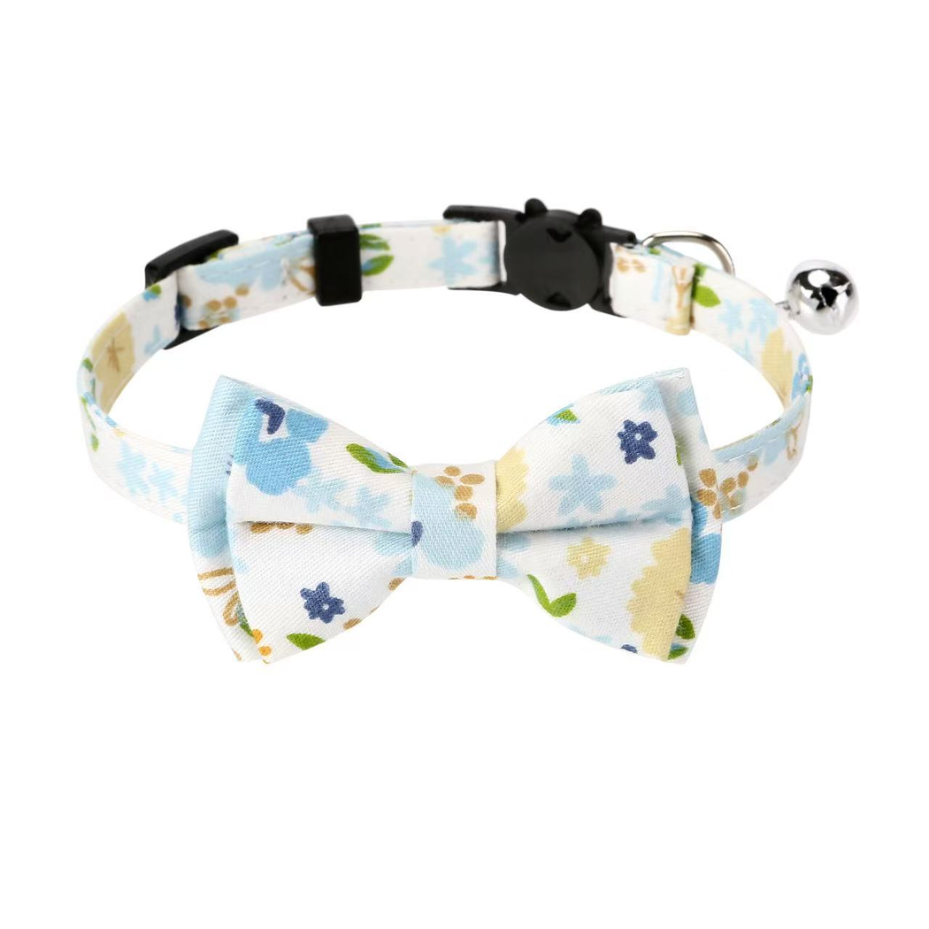 Blue Floral cat collar with bow, cat-face buckle, metal ring, and bell