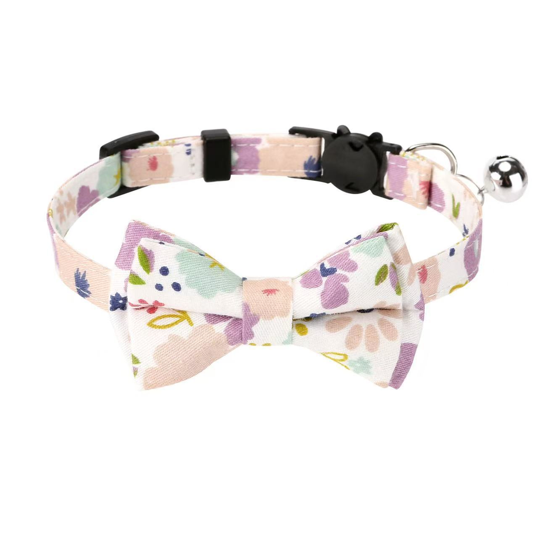 Purple Floral cat collar with bow, cat-face buckle, metal ring, and bell
