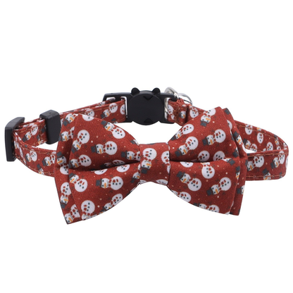 Red Top Hats cat collar with snowman-pattern bow, front view