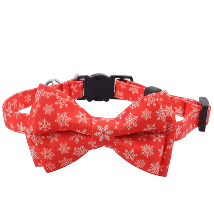 Red Snowflakes cat collar with white snowflake bow, front view