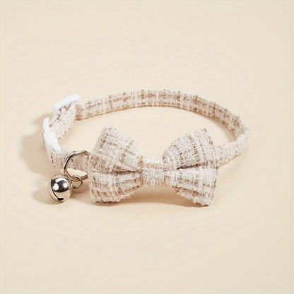 Beige plaid bow cat collar with bell, front view