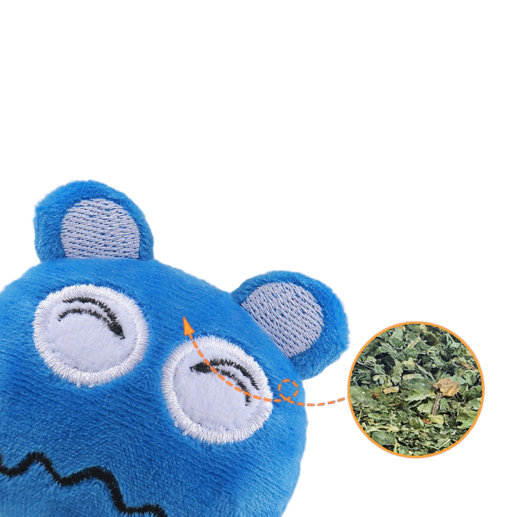Close-up of the Blue monster-face cat toy with an inset of leafy filling
