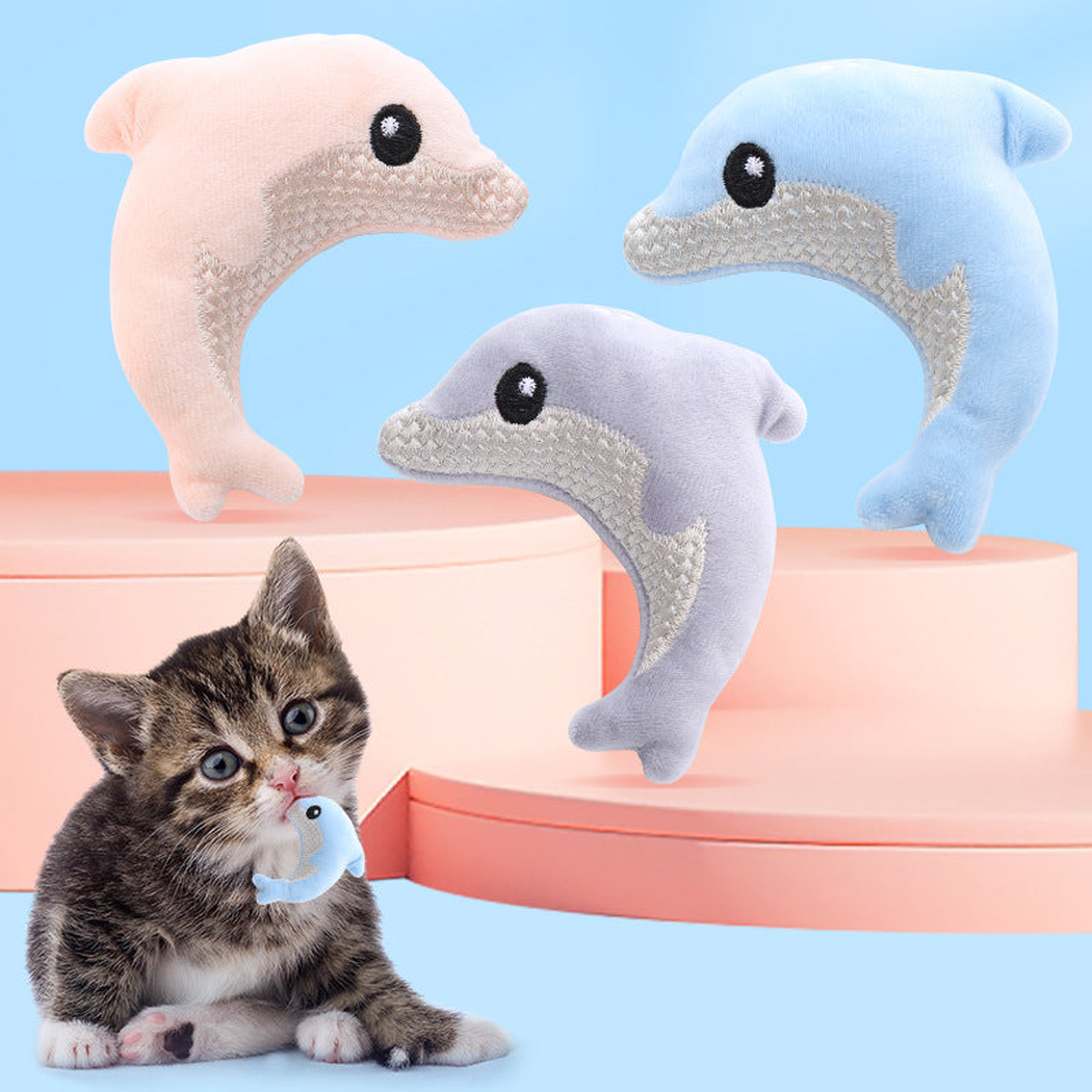Kitten playing with a blue dolphin-shaped cat toy beside three color variations