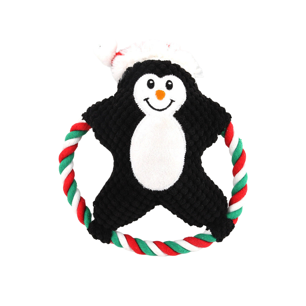 Penguin character dog toy with a red, green, and white rope loop, front view
