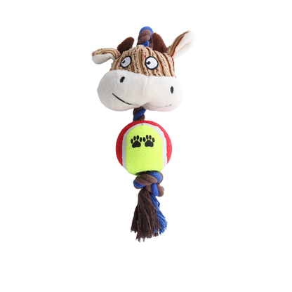 Cow character rope dog toy with red and green ball center and tassel, full view