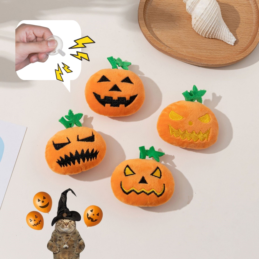 Four orange pumpkin-shaped cat toys displayed with a squeaker insert callout