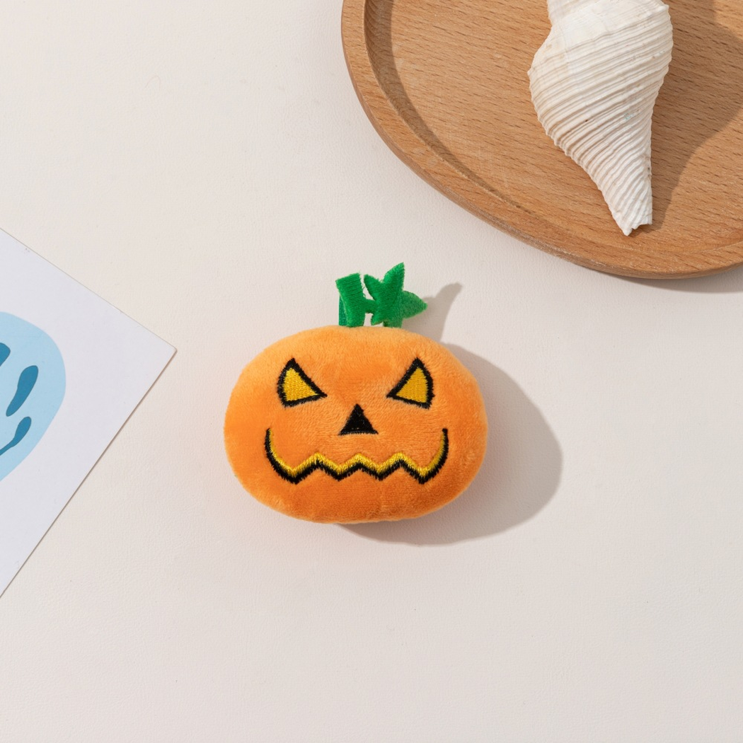 Zigzag Smile orange pumpkin-shaped cat toy, front view