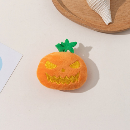Jagged Mouth orange pumpkin-shaped cat toy, front view