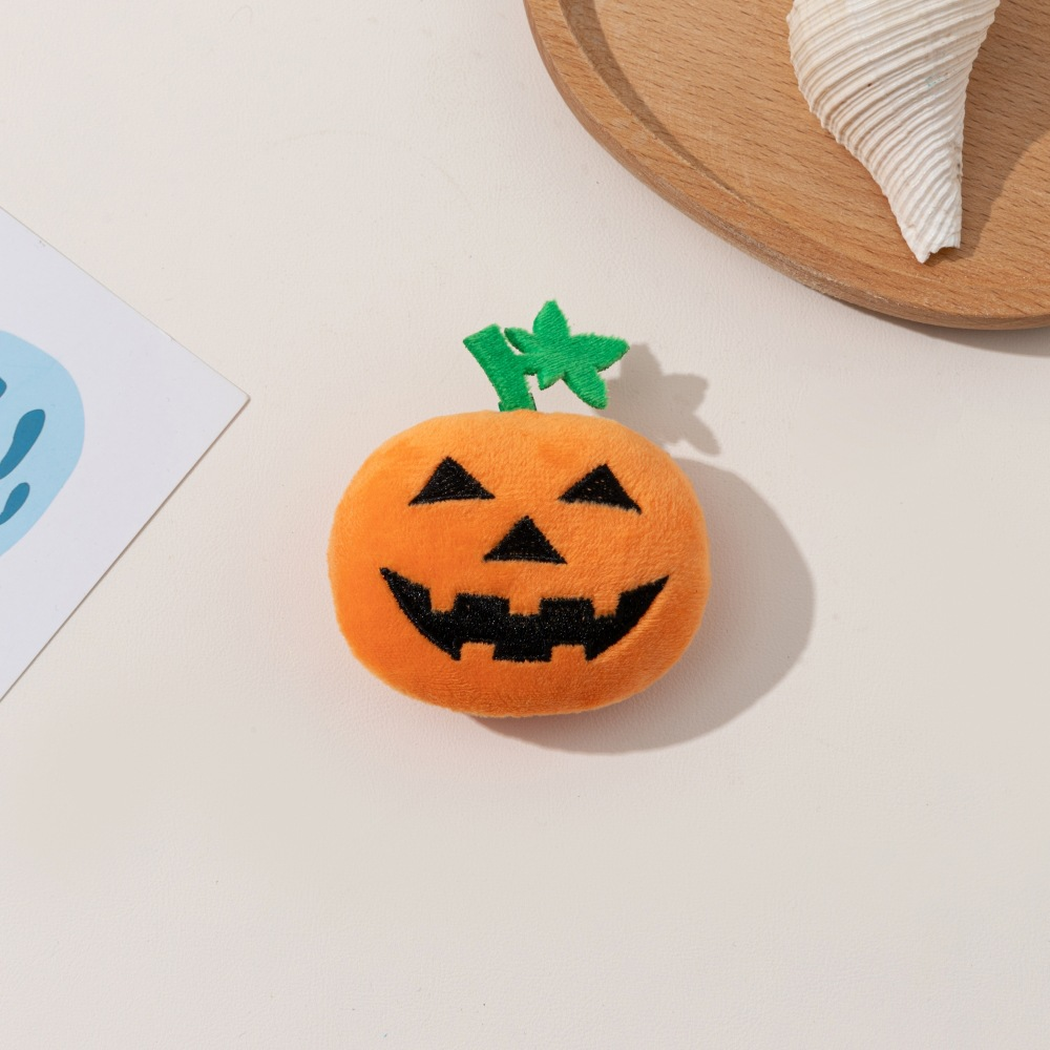 Block Grin orange pumpkin-shaped cat toy, front view
