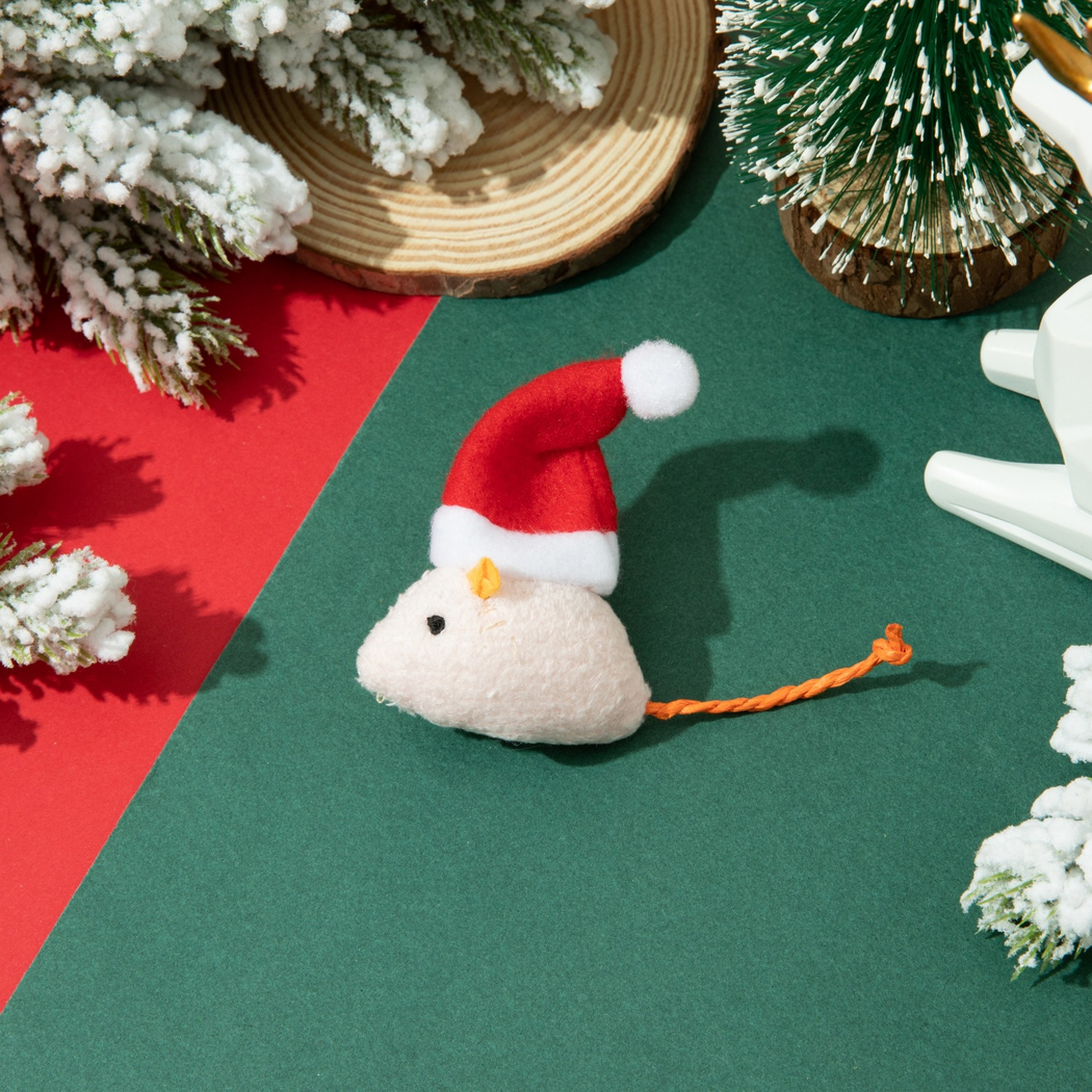 Light pink mouse-shaped cat toy with orange ear accent, Santa hat and orange rope tail