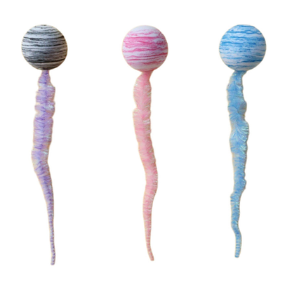 Gray, pink, and blue striped ball-and-tail cat toys on a white background