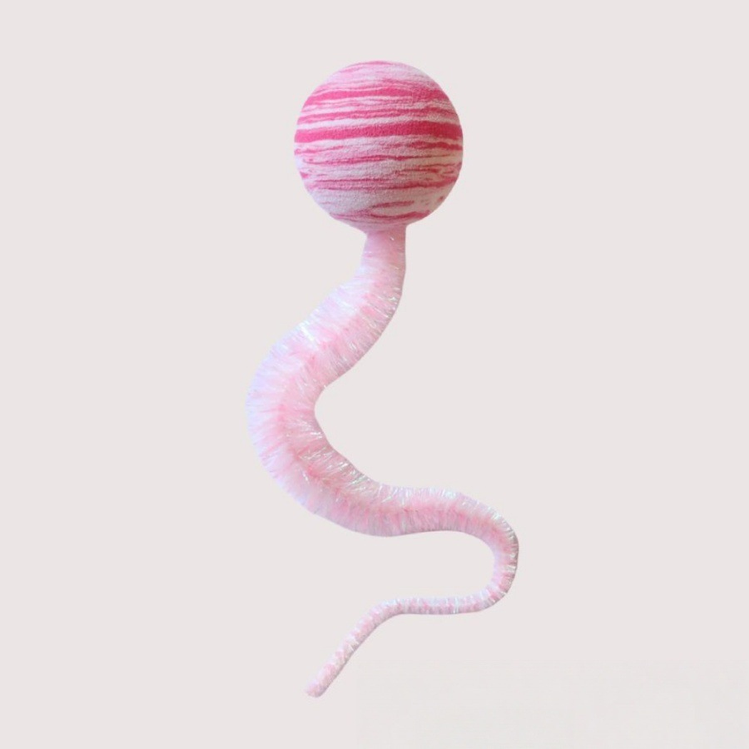 Pink striped ball-and-tail cat toy with a long fuzzy tail