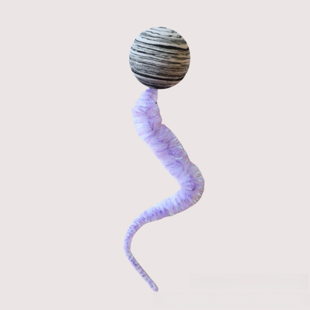 Gray striped ball-and-tail cat toy with a lavender fuzzy tail