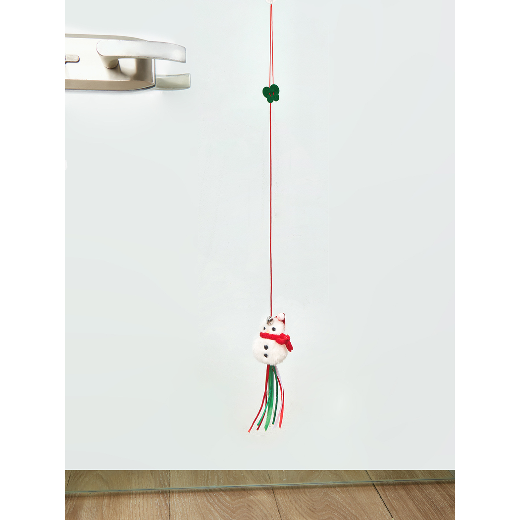 Snowman hanging cat toy mounted on a smooth door