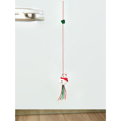 Snowman hanging cat toy mounted on a smooth door