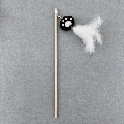 Black paw cat teaser wand with white feather tassel, full view