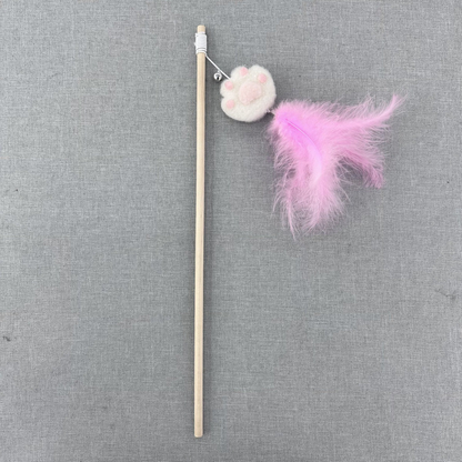 White paw cat teaser wand with pink feather tassel, full view