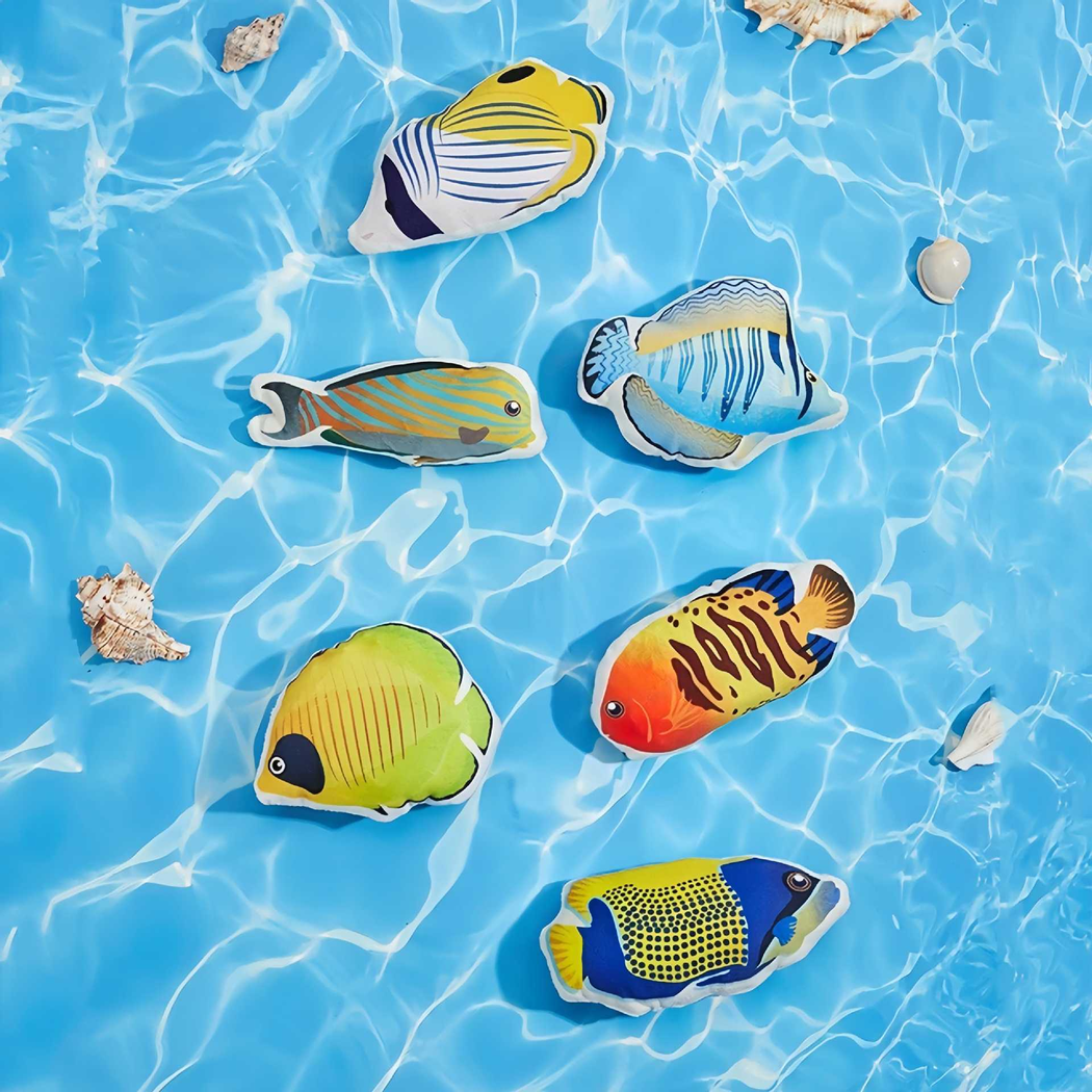 Six colorful fish-shaped cat toy styles arranged on a blue water-pattern background