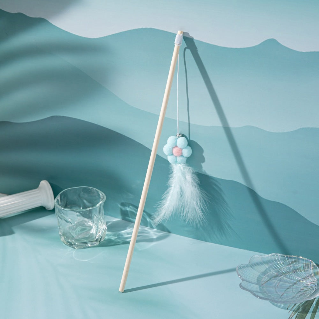 Light blue flower wand cat toy with bell and feather tassel