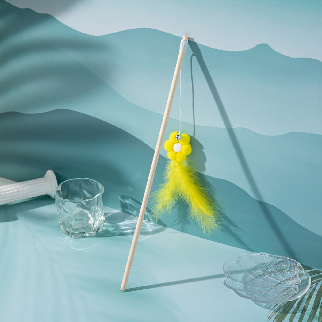 Yellow flower wand cat toy with bell and feather tassel