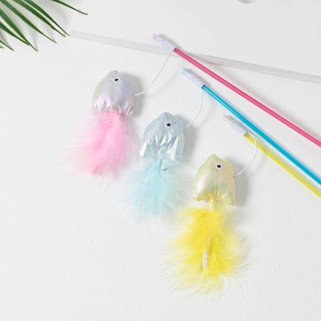 Close-up of iridescent fish attachments and colorful feather tails