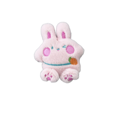 Light pink rabbit character plush cat toy with carrot accent, front view