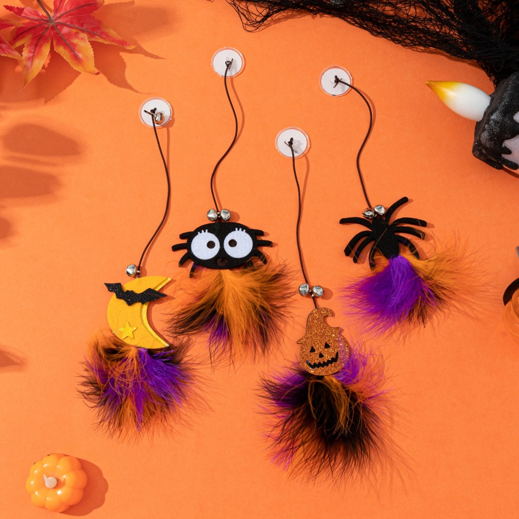 Four Halloween suction-cup dangling cat toy styles with bells and fluffy tassels
