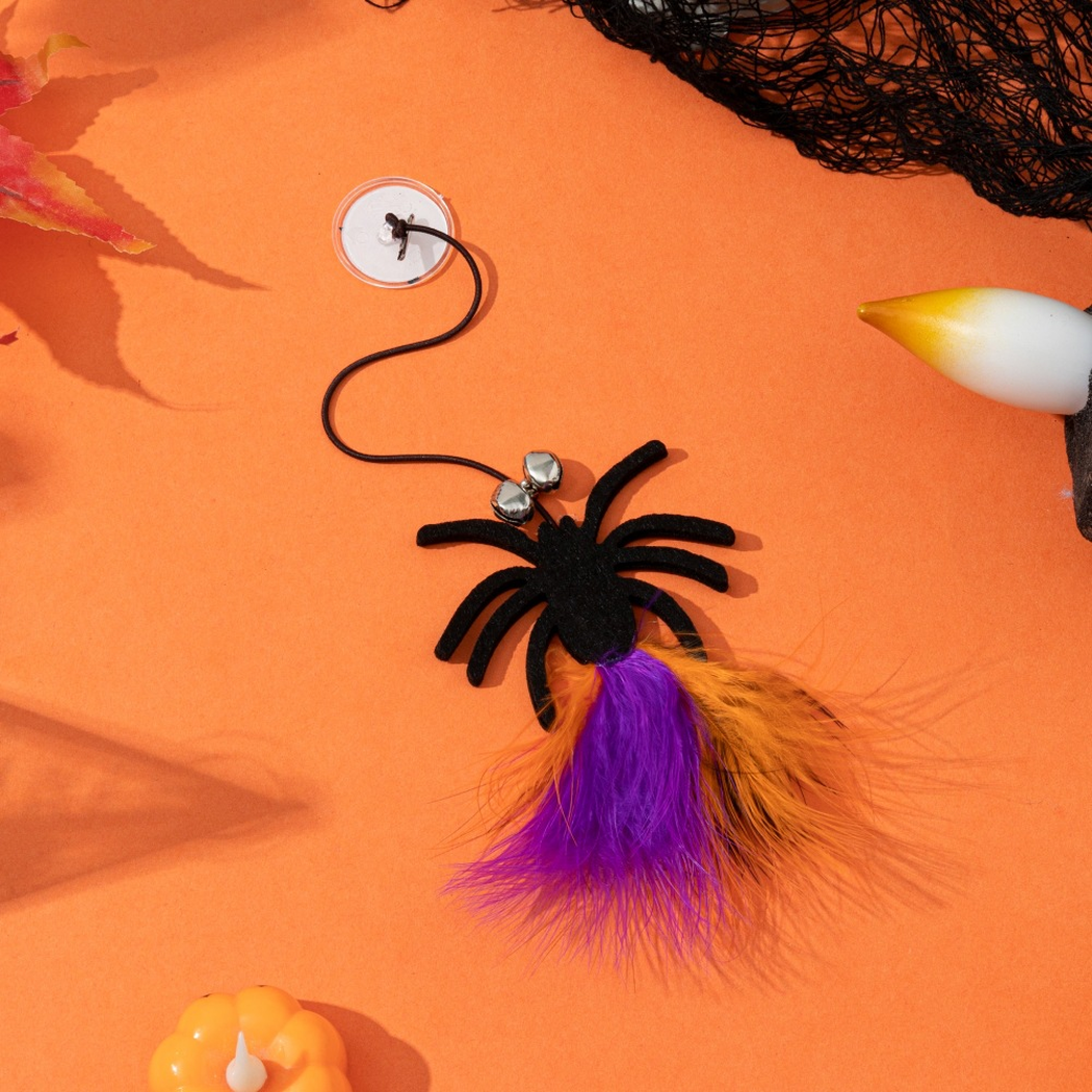 Spider suction-cup dangling cat toy with bells and purple-and-orange fluffy tassel
