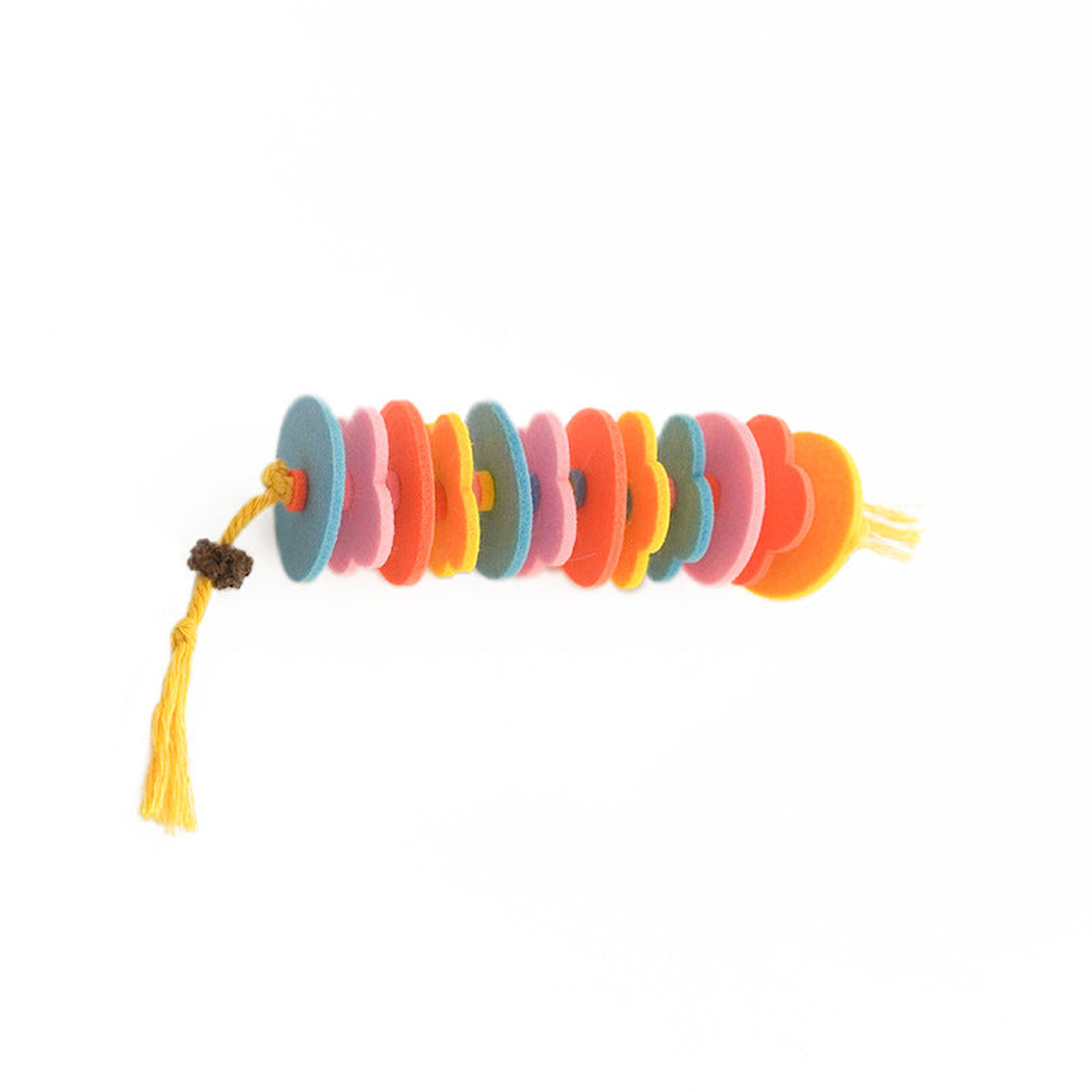 Multicolored disc-and-rope cat toy with yellow tassels
