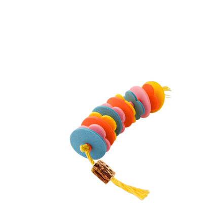 Multicolored disc-and-rope cat toy with tassels, angled view