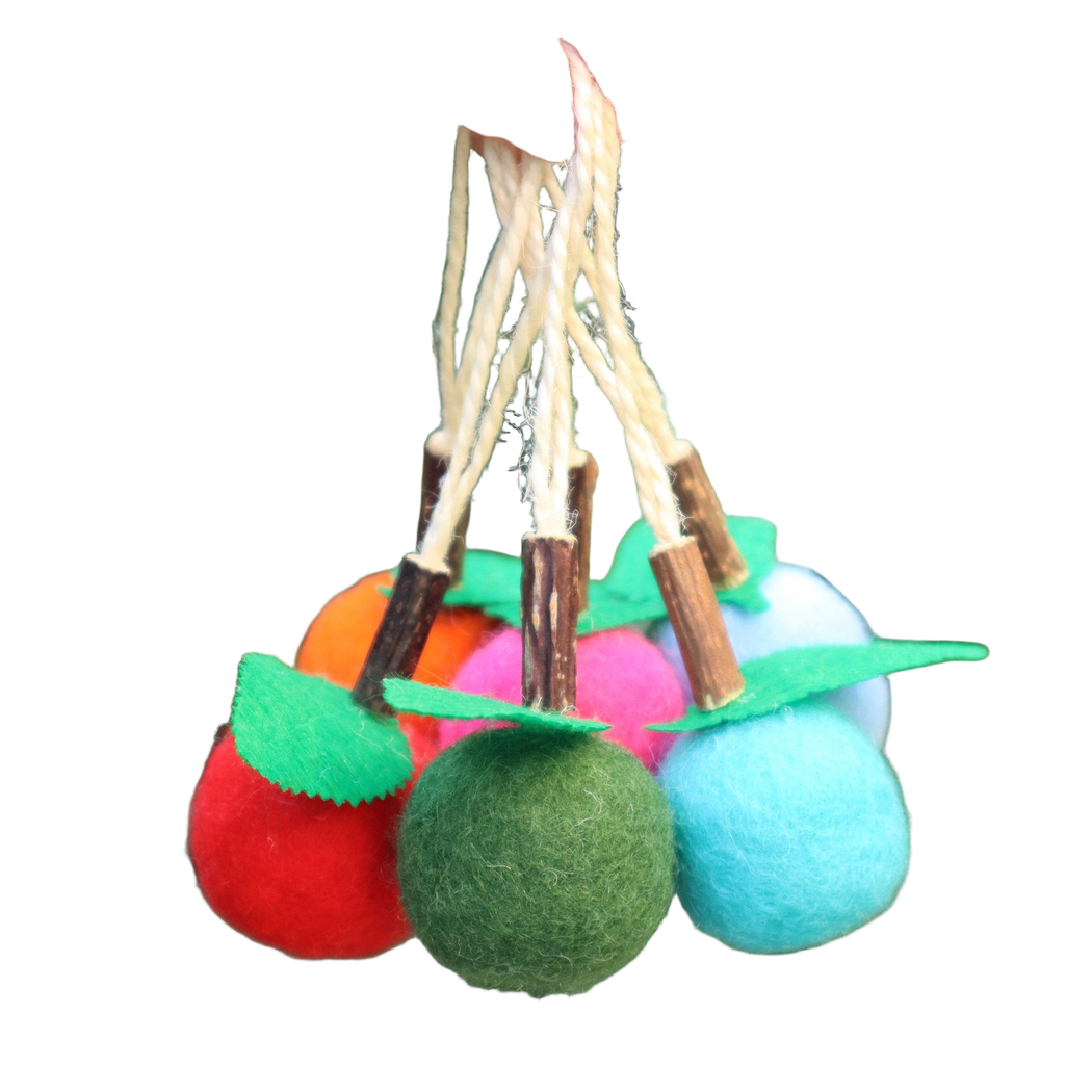 Multiple colors of the fruit-shaped dangling cat toy held together