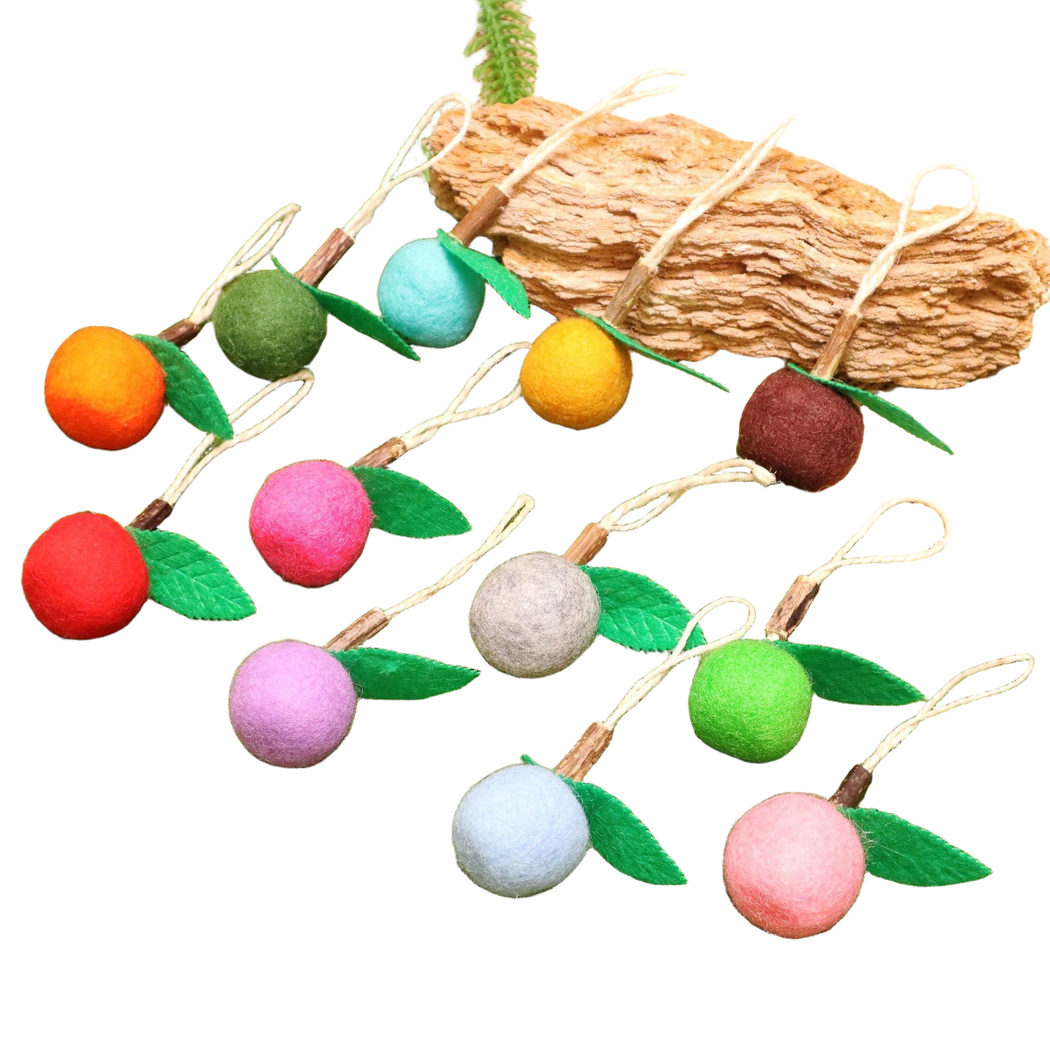 Wide assortment of fruit-shaped dangling cat toys in multiple colors