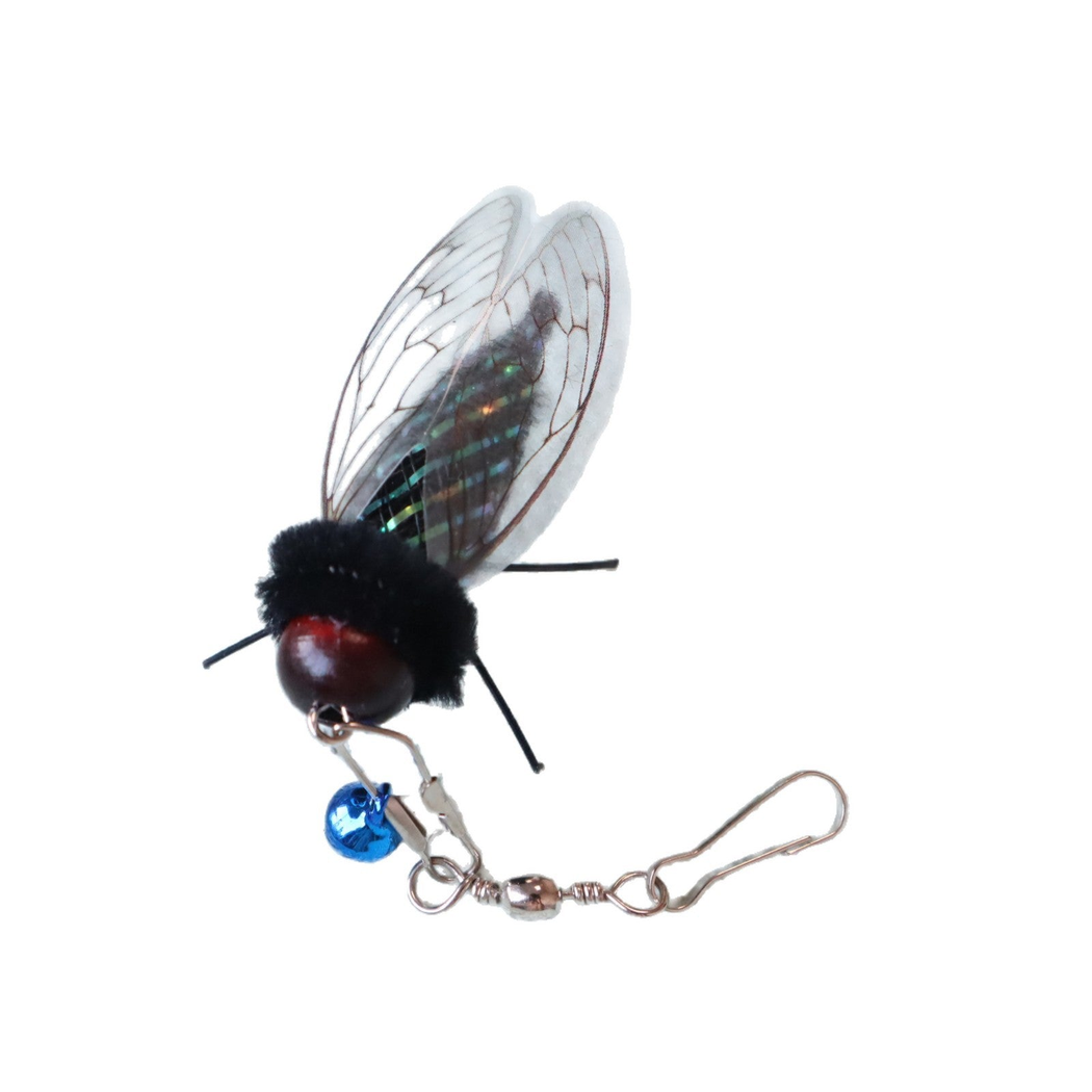 Cicada-shaped cat toy attachment with transparent wings, blue bell and clasp