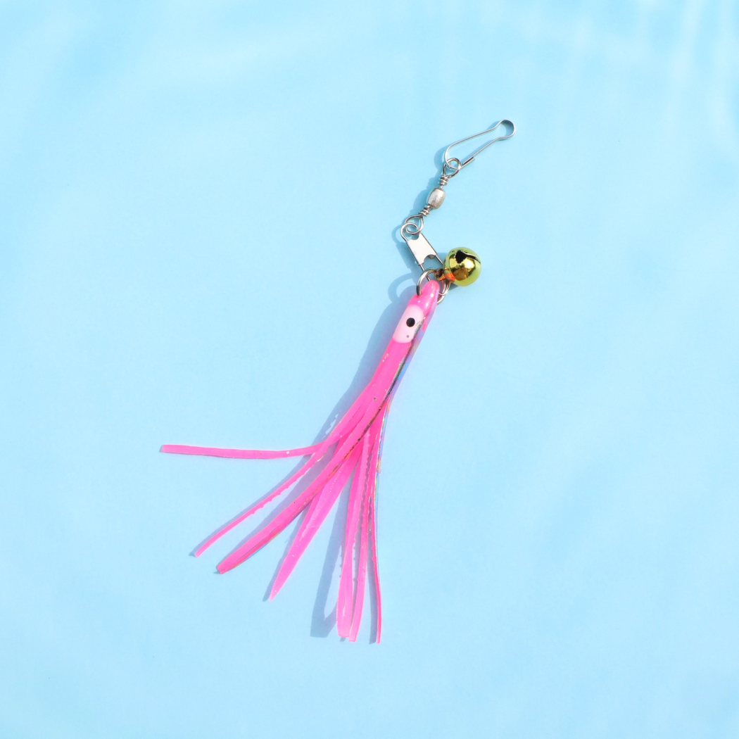 Pink octopus cat toy attachment with gold-tone bell and metal clip