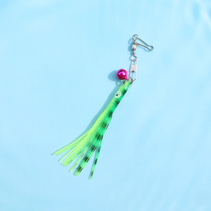 Green octopus cat toy attachment with pink bell and metal clip