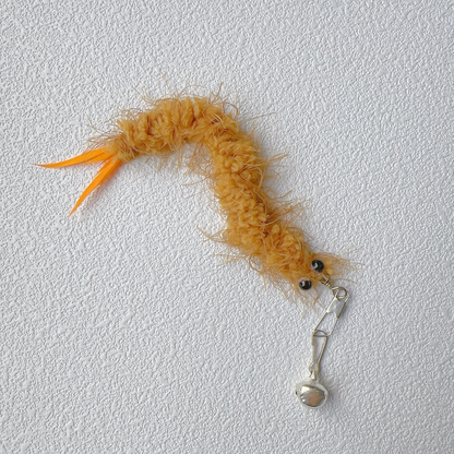 Brown fuzzy cat teaser replacement toy with orange tail feathers, clip, and bell