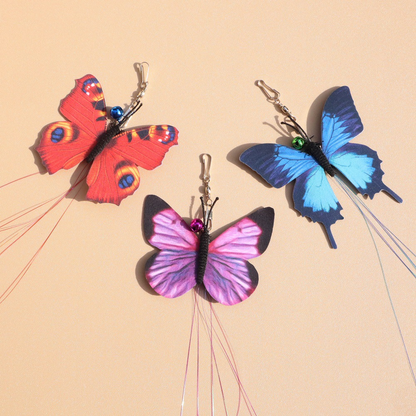 Blue, Purple and Red butterfly cat teaser replacement heads displayed together
