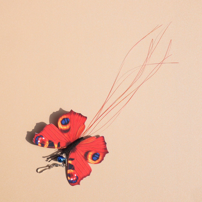 Red butterfly cat teaser replacement head with clip, bell and trailing strands