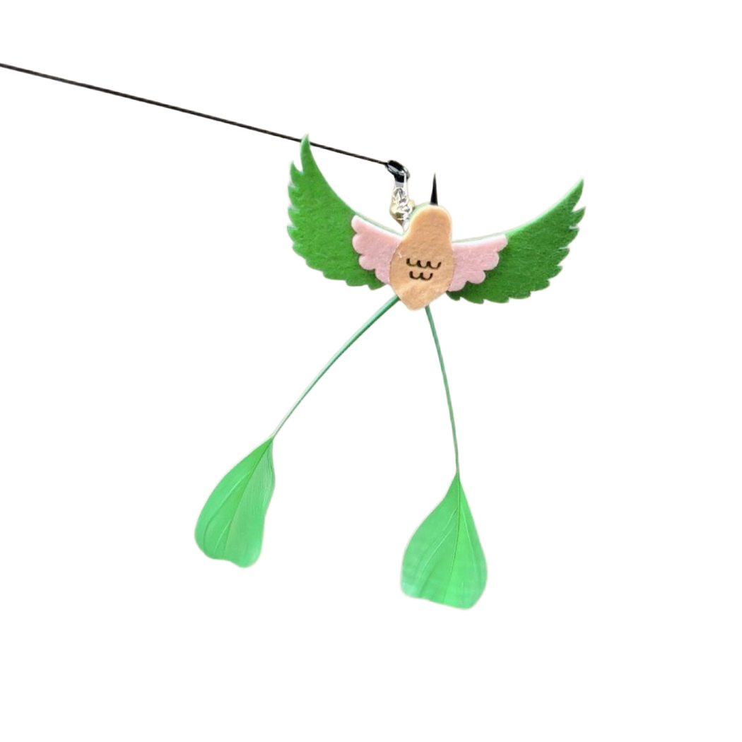 Green and pink long-tailed bird-shaped cat toy attachment hanging from its clip