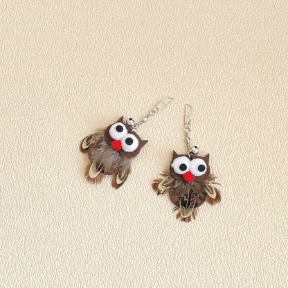 Two owl-shaped cat toy attachments with clips and bells
