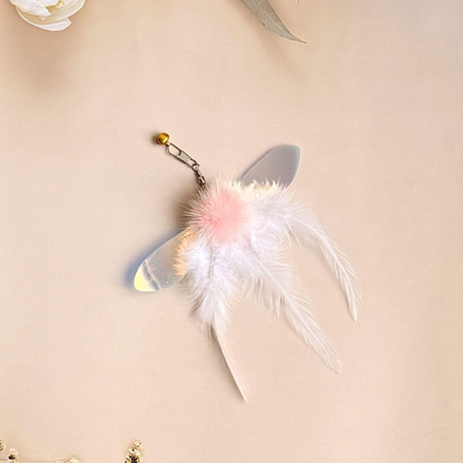 White feather cat toy attachment with iridescent accents and bell