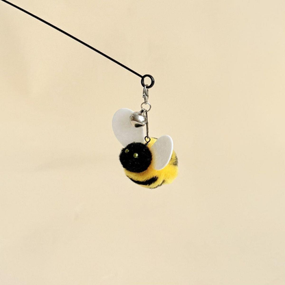 Yellow-and-black bee-shaped cat teaser wand attachment with white wings and bell