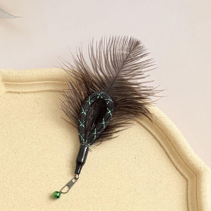 Dark feather cat wand attachment with black mesh loop and green bell