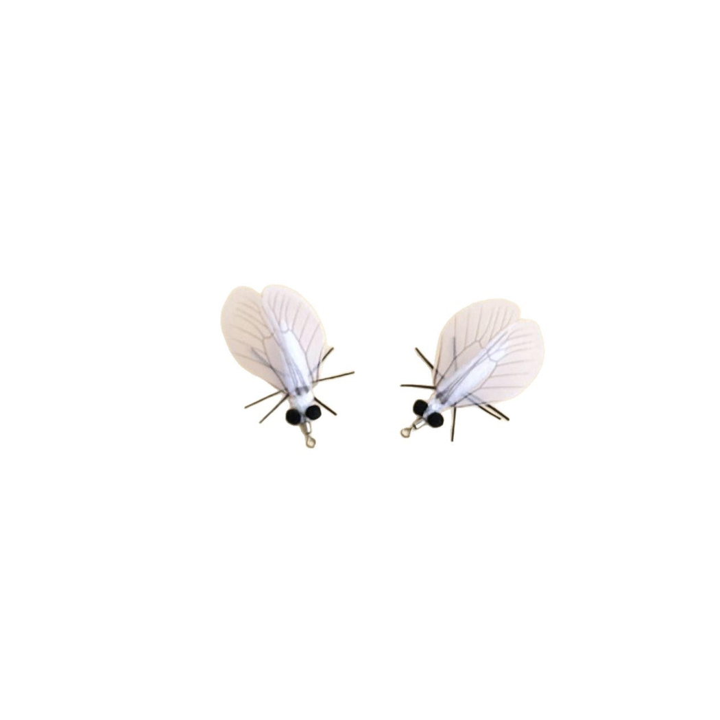 Two white moth-shaped cat toys on a plain white background