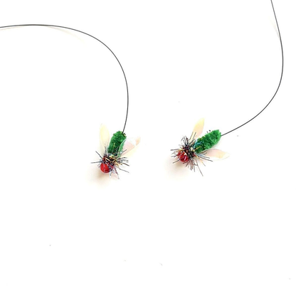 Two fly-shaped cat teaser replacement heads with green bodies and translucent wings
