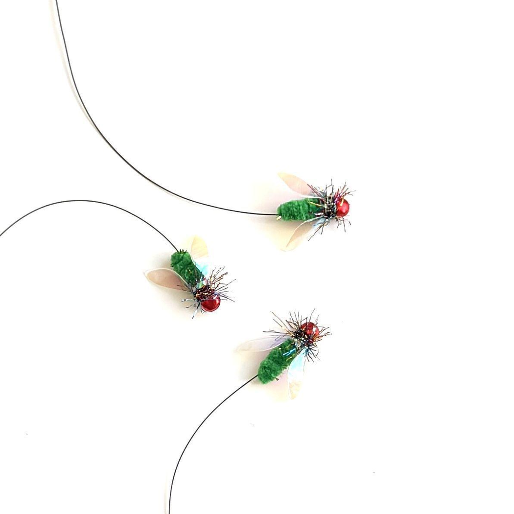 Three fly-shaped cat teaser replacement heads with long black attachment lines