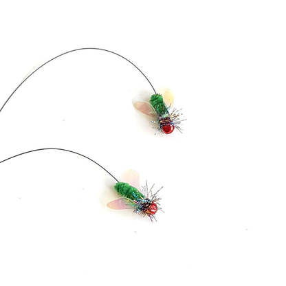 Two fly-shaped cat teaser replacement heads showing top and angled views