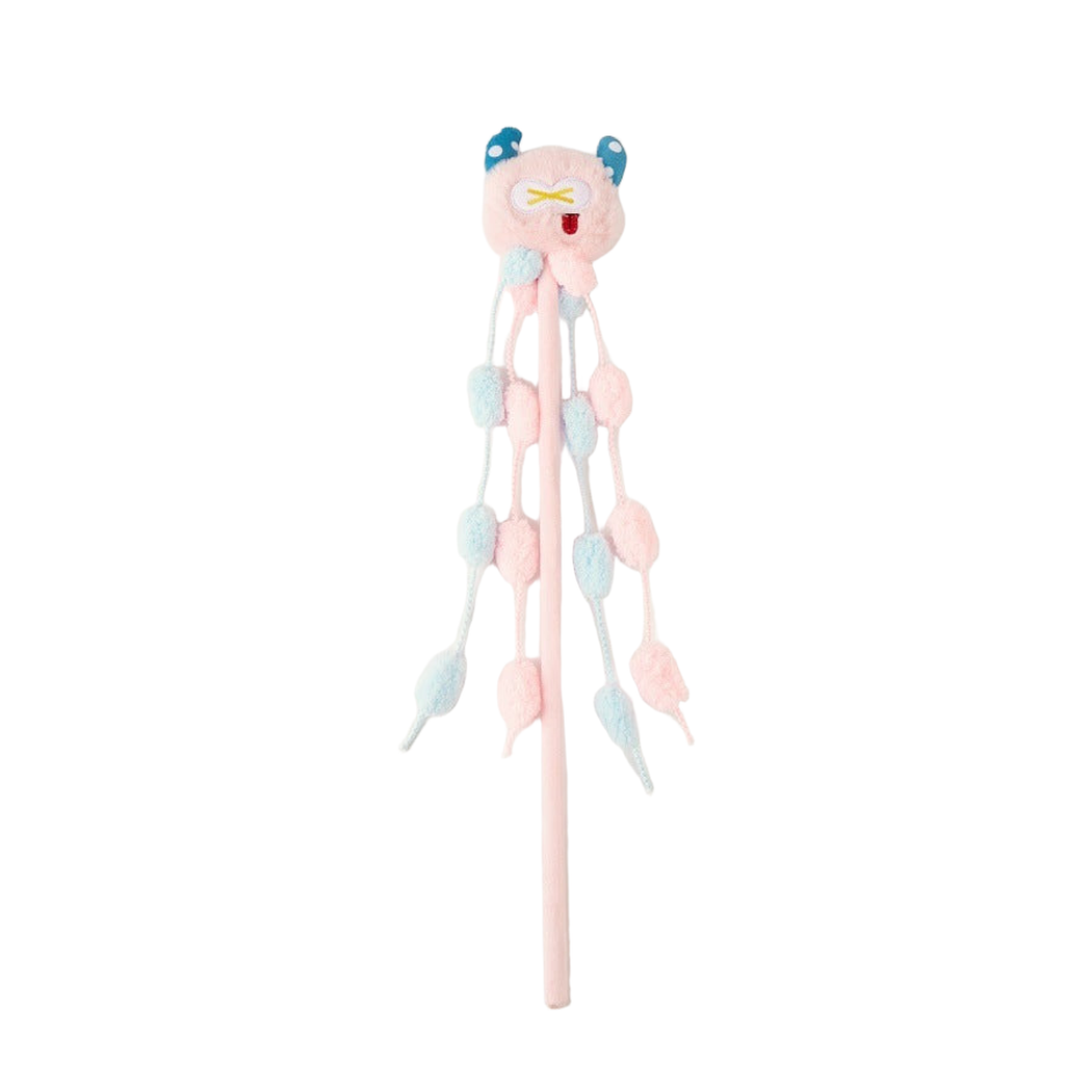 Monster wand cat toy with blue horns and pink and blue hanging tufts