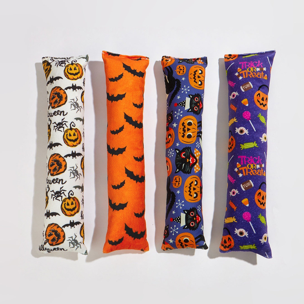 Four Halloween-pattern elongated cat toys displayed together