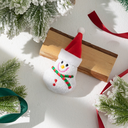 Snowman character cat toy with red hat and striped scarf